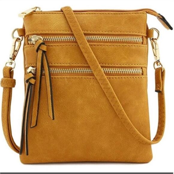 Marigold Leather Crossbody Bag. Zippered pockets, adjustable strap. Too cute! - Picture 1 of 6